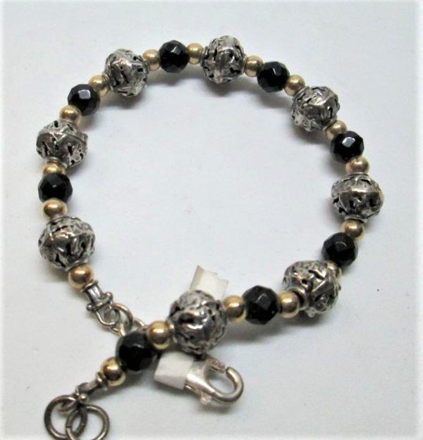 Handmade Onyx stones silver bracelet, sterling silver & 14 carat gold beads with faceted Onyx stones 0.9 cm X 20.5 cm approximately.