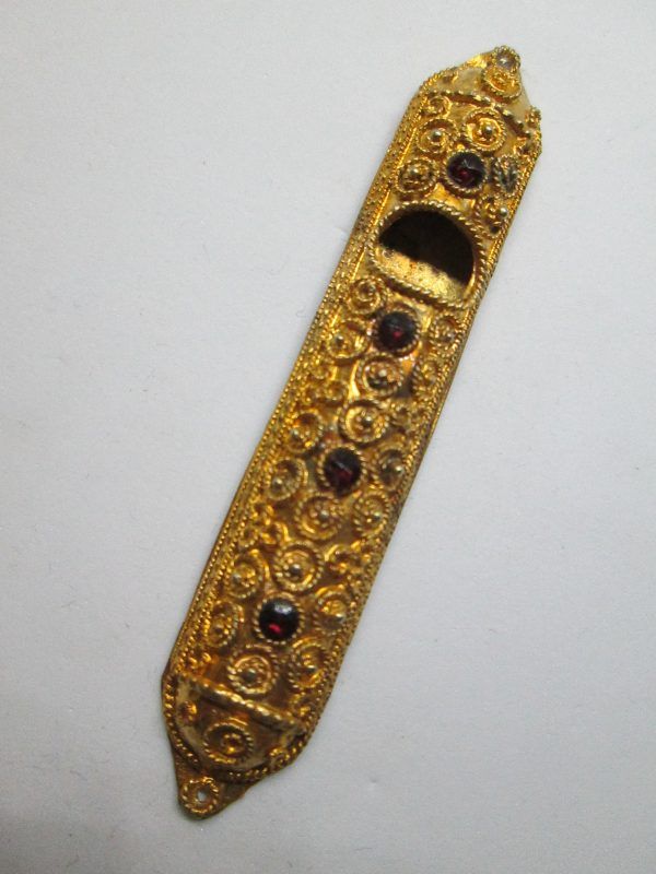 Silver Mezuzah gold plated set with 4 faceted Garnet stones. Suitable for parchment up to 6 cm .Dimension 1.5 cm X 8 cm approximately.