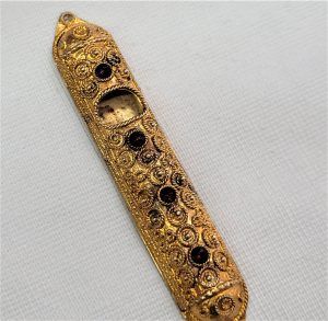 Silver Mezuzah gold plated set with 4 faceted Garnet stones. Suitable for parchment up to 6 cm .Dimension 1.5 cm X 8 cm approximately.