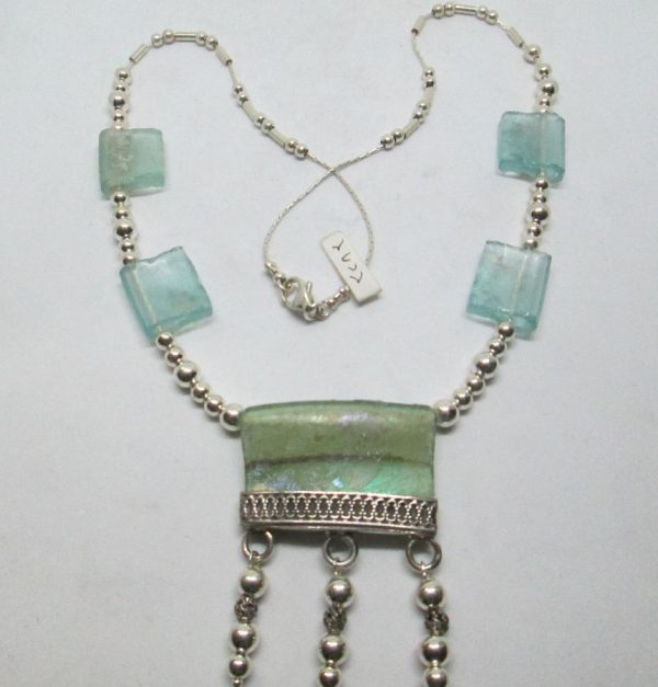 Handmade sterling silver Roman glass necklace set with genuine Roman glass Yemenite filigree. Dimension 3.3 cm X 4.7 cm approximately.