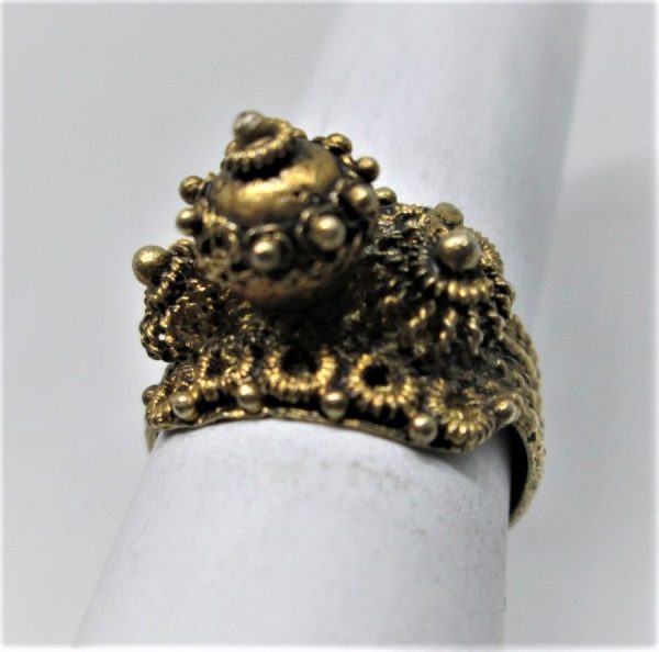 Vintage Yemenite filigree gold plated ring made in Israel in the 1950's by Yemenite Jews. Dimension 1.5 cm X 1.9 cm ring size adjustable.