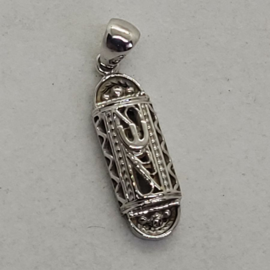 18 carat white gold Yemenite Filigree Mezuzah pendant white gold solid hand made in Israel. Dimension 0.6 cm X 2.4 cm X 0.5 cm approximately.