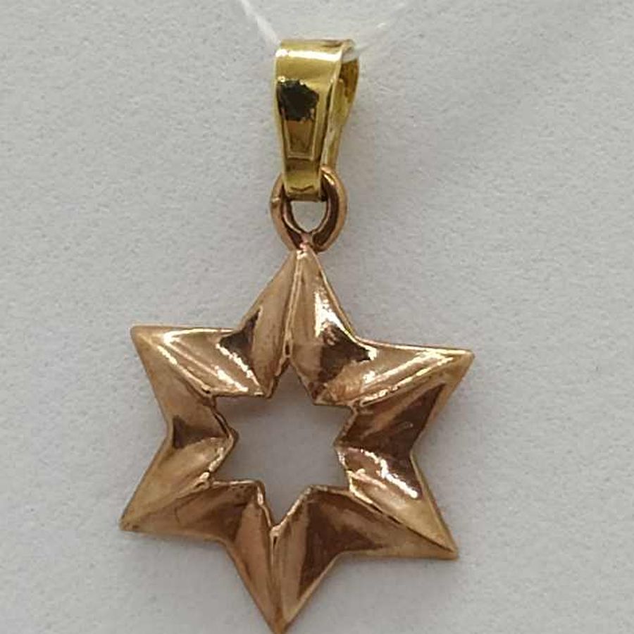 14 Carat rose color gold Magen David star pendant rose gold Magen David handmade solid gold 1.25 cm X 1.35 cm X 0.2 cm approximately.
