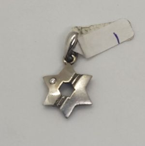 Handmade 14 carat white gold star MagenDavid pendant white gold set with white cubic Zircon stone 1.1 cm X 1.3 cm X 0.2 cm approximately.