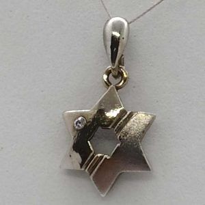 Handmade 14 carat white gold star MagenDavid pendant white gold set with white cubic Zircon stone 1.1 cm X 1.3 cm X 0.2 cm approximately.