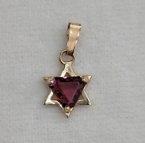 Handmade 14 carat solid gold faceted Garnet Magen David star triangle shape red faceted Garnet stone forming a David star pendant.