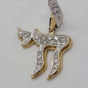 14 carat white & yellow gold Pendant Gold Hay Zirconias set with 17 white Zirconia stones. Dimension 2.75 cm X 2.15 X 0.3 cm approximately.