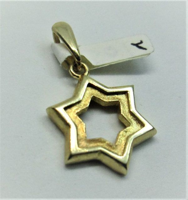 Contemporary 14 carat yellow gold Magen David star pendant modern heavy cut out design. Dimension 1.5 cm X 1.7 cm X 0.26 cm approximately.