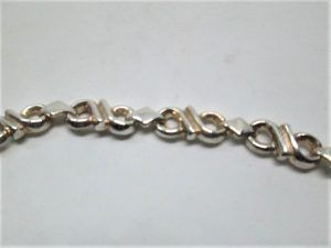 Handmade sterling silver bracelet infinity symbol contemporary shape design. Dimension 0.9 cm X 19.8 approximately.