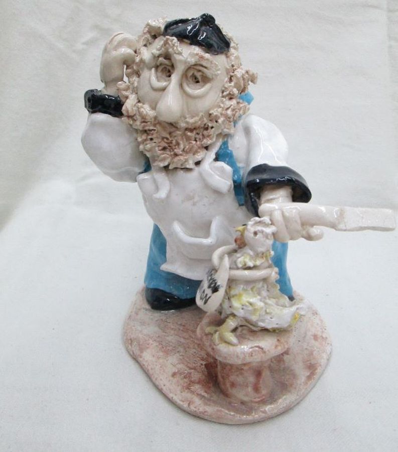 Ceramic Sculpture Shochet Slaughterer Handmade slaughter a chicken for delicious onion soup. Dimension 16.5 cm X 14.4 cm X 11.5 cm.