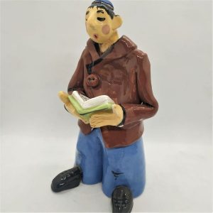 Handmade glazed ceramic Yeshiva Boy Ceramic Sculpture reciting his daily prayers made by Ulshansky. Dimension 22 cm X9.5 cm X 9 cm approximately.