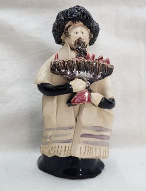 Handmade glazed ceramic sculpture of a Rabbi Lighting Hanukah Menorah made by Y. Dar. Dimension 4.8 cm X 12 cm X 5.9 cm approximately.