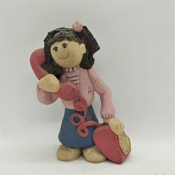 Handmade Girl Chatting Ceramic Sculpture on the traditional phone made by Sakolovsky. Dimension 11 cm X 5 cm X 7 cm approximately.