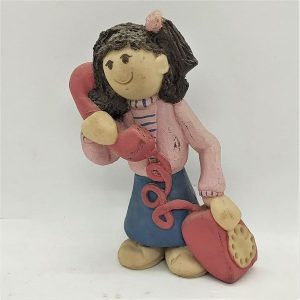 Handmade Girl Chatting Ceramic Sculpture on the traditional phone made by Sakolovsky. Dimension 11 cm X 5 cm X 7 cm approximately.
