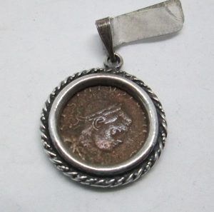 Pendant Silver Roman Coin handmade. Sterling silver pendant set with genuine antique Roman bronze coin from the 2nd century AD. Dimension diameter 2.1 cm.