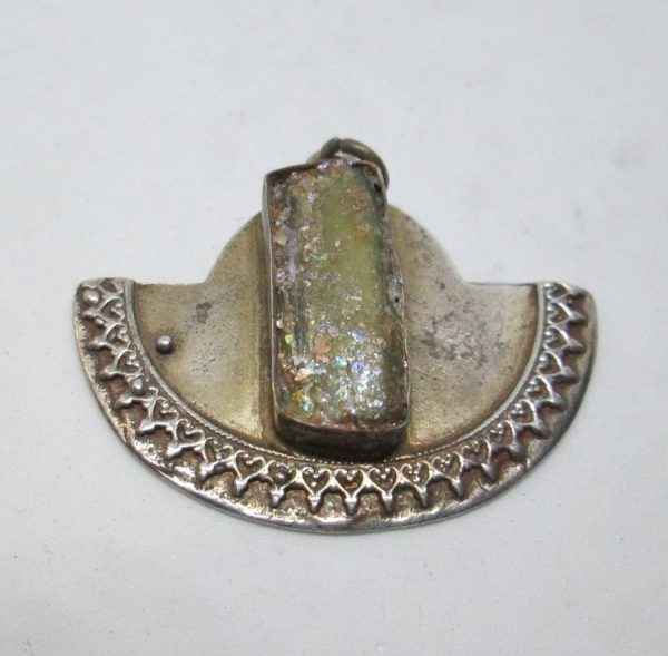 Handmade sterling silver half round shape pendant set with genuine Roman glass and Yemenite filigree design. Dimension 2.8 cm X 3.4 cm approximately.