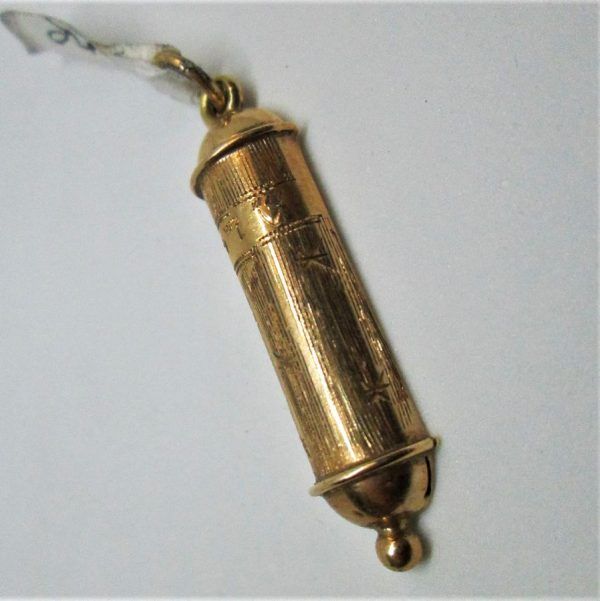 14 carat gold Mezuzah pendant rose gold vintage from the 1950's made in Israel. Dimension 0.9 cm X 3 cm approximately.