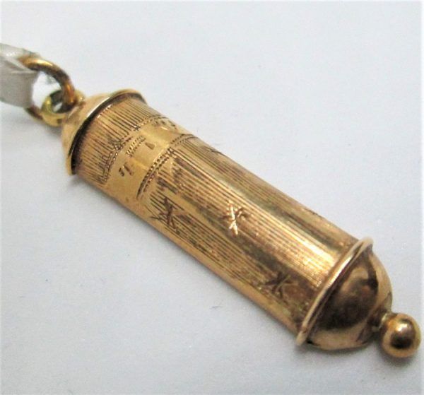 14 carat gold Mezuzah pendant rose gold vintage from the 1950's made in Israel. Dimension 0.9 cm X 3 cm approximately.