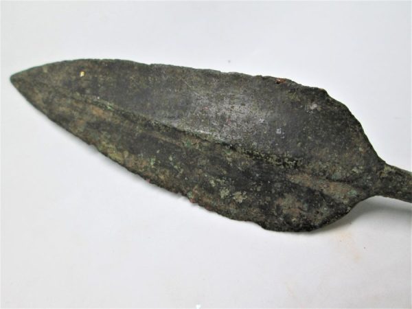 Antique bronze arrowhead long genuine Bronze age 1000 BC found in the holy land Israel. Dimension 12.5 cm X 2.7 approximately.