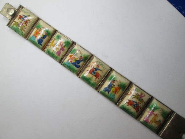 Vintage hand painted bracelet designs on camel bones pieces set in silver bracelet vintage made in the early 20th century in the Middle East.