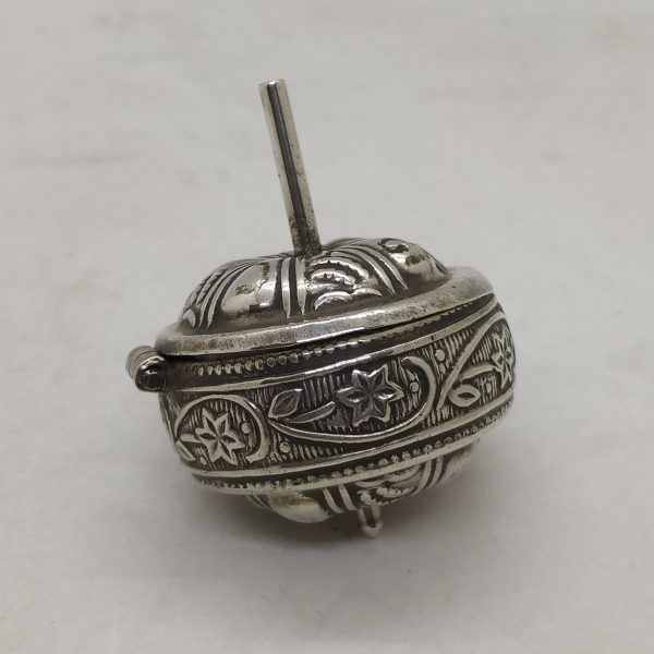 Handmade sterling silver dreidel silver and a spice box as well. Handmade by S. Ghatan ( Katan). Dimension diameter 3.2 cm X 4.3 cm.