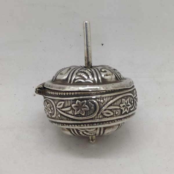 Handmade sterling silver dreidel silver and a spice box as well. Handmade by S. Ghatan ( Katan). Dimension diameter 3.2 cm X 4.3 cm.
