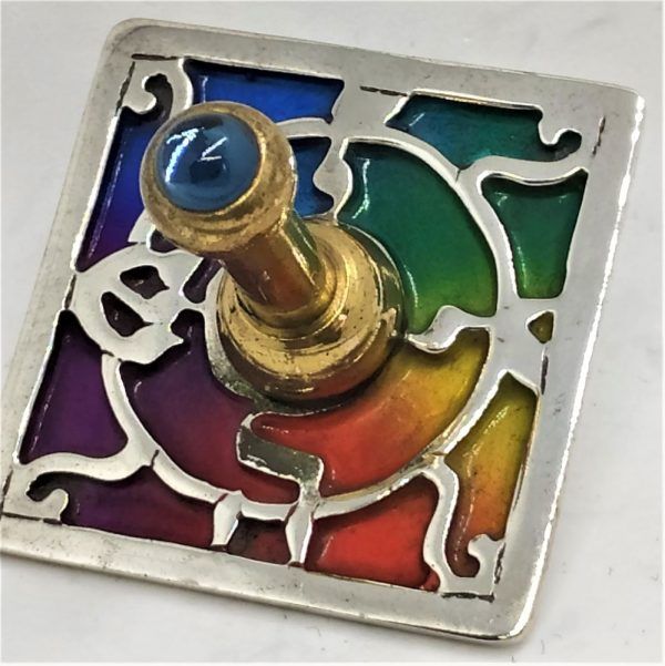 Handmade sterling silver & brass sevivon silver square enameled contemporary cut out designs set with colored enamel. Dimension 3.7 cm X 3.7 cm X 3.6 cm.