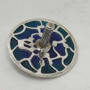 Handmade sterling silver Hanukah Dreidel Enameled Blue and green contemporary cut out  designs. Dimension diameter 3.6 cm X 2.3 cm.
