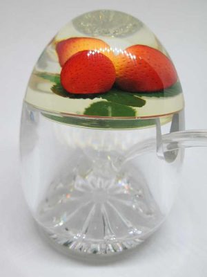 RoshHashana honey dish strawberries Perspex with strawberries in Perspex cover and a spoon.  Dimension diameter 8.8 cm X 11.2 cm approximately.