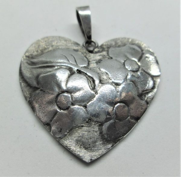 Sterling Silver Pendant Contemporary Heart shape with four leaves flowers shapes. Dimension 3.3 cm X 3.8 cm approximately.
