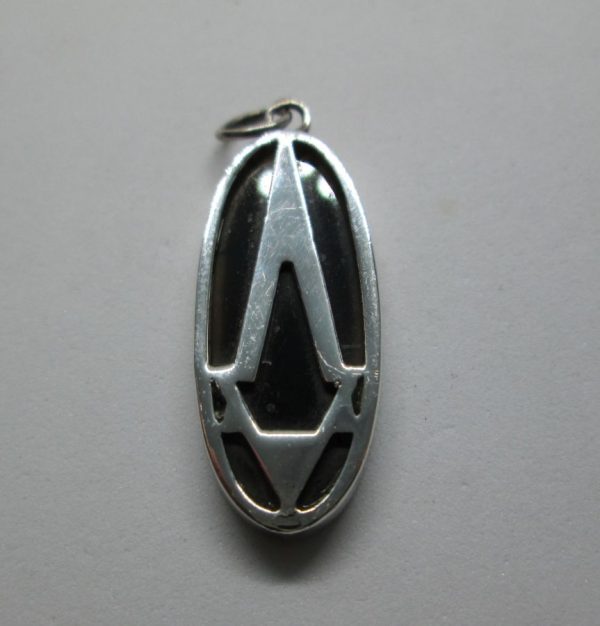A modern design elongated Magen David Star Pendant Onyx oval shape sterling silver pendant. Dimension 1.2 cm X 3.3 cm approximately.