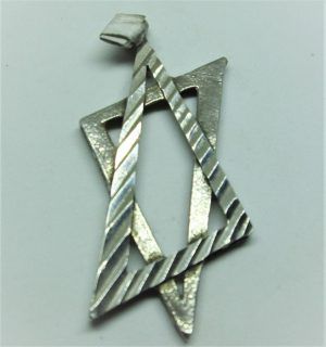 Sterling silver David star pendant contemporary design suitable for women and men. Dimension  2.2 cm X 4.8 cm  approximately.