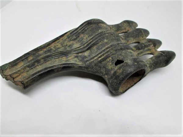Genuine Bronze axe head antique 1500 BC. It has been found without one part that might have broken years ago and covered in earth since then.