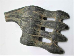 Genuine Bronze axe head antique 1500 BC. It has been found without one part that might have broken years ago and covered in earth since then.