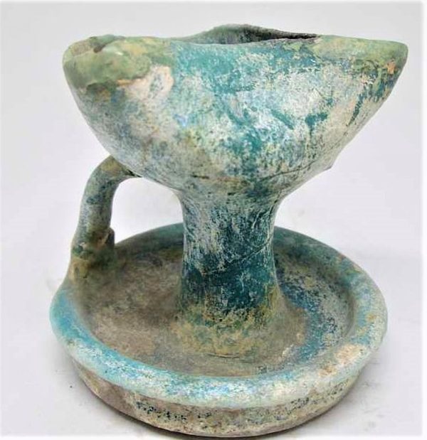 Genuine antique Islamic glazed pottery lamp 10th century CE with blue glazing, the common color used in the middle East to get away the evil.