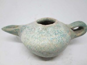 Antique Islamic era Islamic glazed oil lamp 10th century CE with blue glazing, the common color used in the middle East to get away the evil.