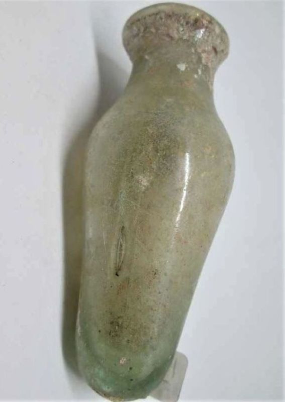 Genuine Antique roman glass amphora found in Israel 1st century BC.  One can see the antique patina on it  made two millennium ago.