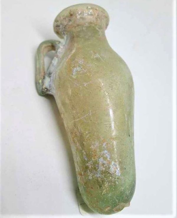 Genuine Antique roman glass amphora found in Israel 1st century BC.  One can see the antique patina on it  made two millennium ago.