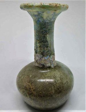 Genuine Antique roman glass vase found in Israel 1st century BC.  One can see the antique patina on it and the plant roots that grew inside.