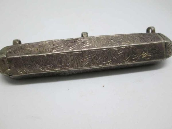 An antique Muslim silver amulet case vintage with Islam phrase quoted from the Korean to bless person carrying it 8.1 cm X 1.8 cm X 1.5 cm approximately.