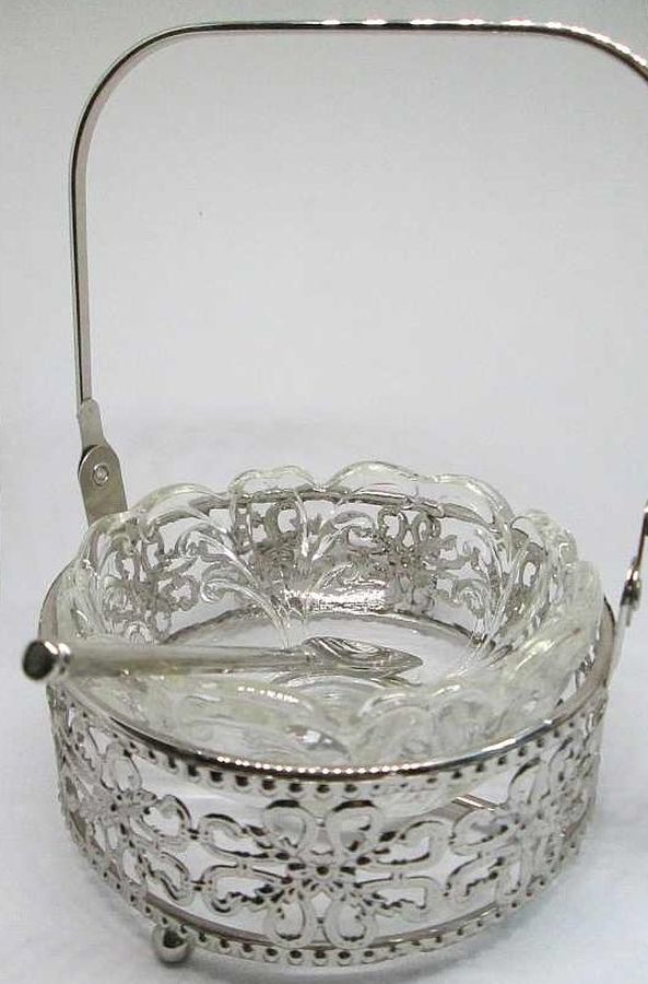 Handmade RoshHashana Honey Dish Silverplated cut out designs with glass dish & spoon. Dimension diameter 11.5 cm approximately.