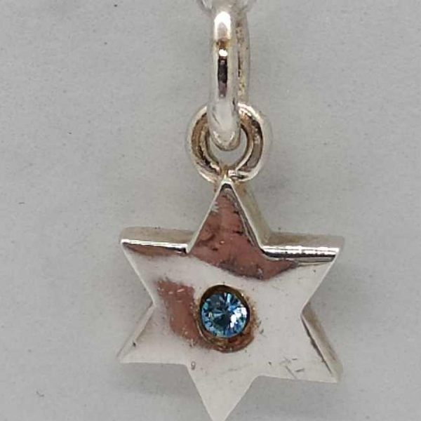 Sterling silver tiny MagenDavid star pendant blue stone tiny shiny star handmade. Dimension 1.15 cm X 1.9 cm X 0.2 approximately.