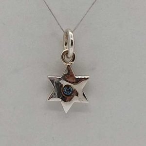 Sterling silver tiny MagenDavid star pendant blue stone tiny star. Dimension 1.15 cm X 1.9 cm X 0.2 approximately.
