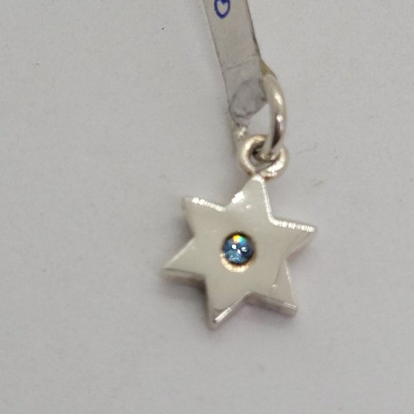 Sterling silver tiny MagenDavid star pendant blue stone tiny shiny star handmade. Dimension 1.15 cm X 1.9 cm X 0.2 approximately.