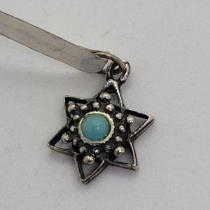 Sterling Silver Magen David Star Pendant Yemenite Turquoise. Tiny Yemenite filigree star set with Turquoise. Dimension 1.1 cm X 1.3 cm X 0.2 cm.