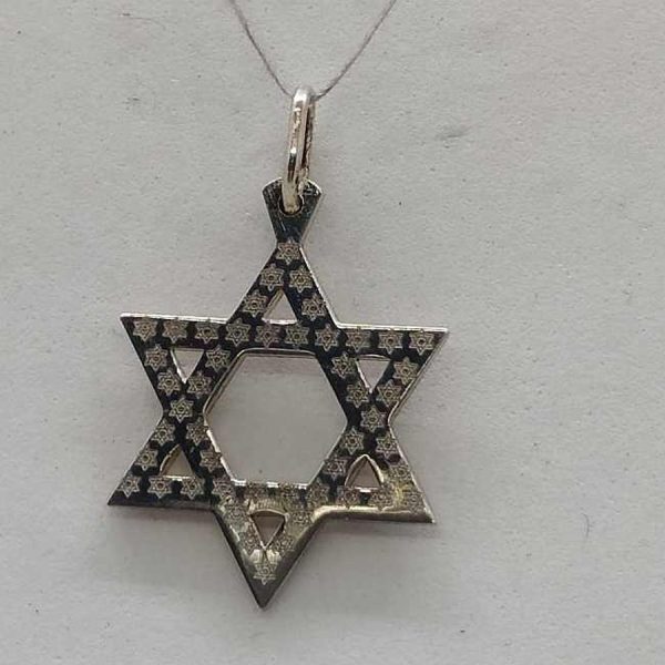 Handmade sterling silver traditional shape MagenDavid 45 Tiny Stars all carved over star. Dimension 1.7 cm X 2.3 cm X 0.1 cm.