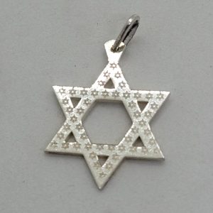 Handmade sterling silver traditional shape MagenDavid 45 Tiny Stars all carved over star. Dimension 1.7 cm X 2.3 cm X 0.1 cm.