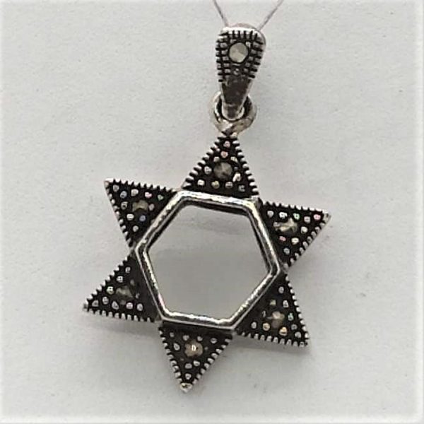 Sterling Silver Marquisettes Magen David Pendant Black faceted stones set in. Dimension 1.7 cm X 2.7 cm X 0.28 cm approximately.