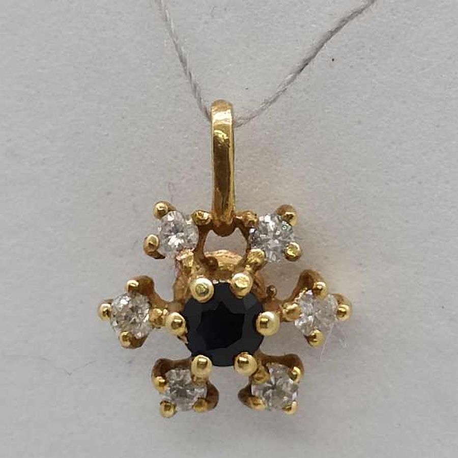 Handmade 14 Carat yellow Gold Magen David Diamonds Sapphire set with 6 diamonds and a blue Sapphire forming a Magen David star pendant.