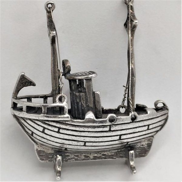 A handmade sterling silver Miniature Statue Sailing Boat with two sailing poles. Dimension 4.1 cm X 4.1 cm X 1.75 cm approximately.